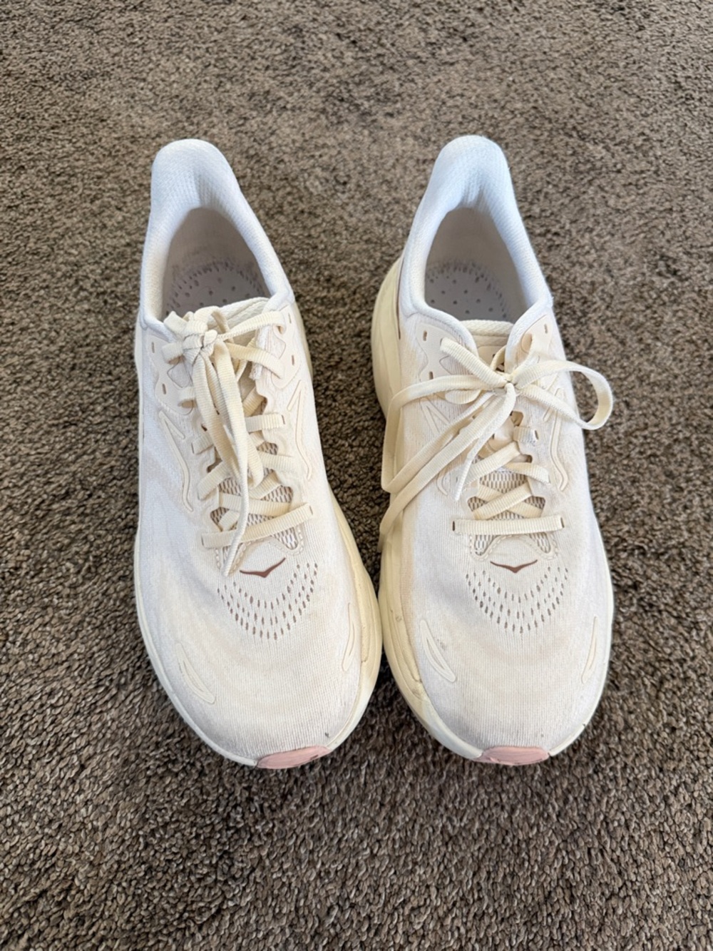 Hoka Women’s Cream and Light Pink Running Sneakers
